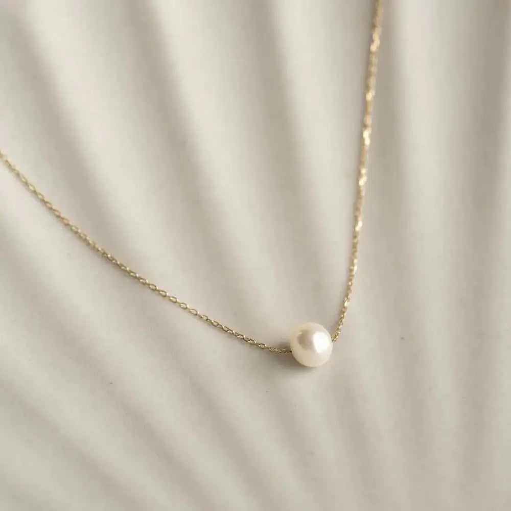 Collier point lumineux zircon