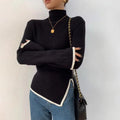 Pull col roulé à manches évasées – noir