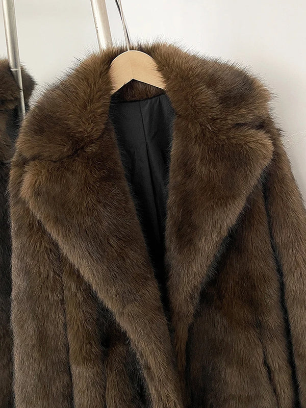 Manteau en fausse fourrure femme