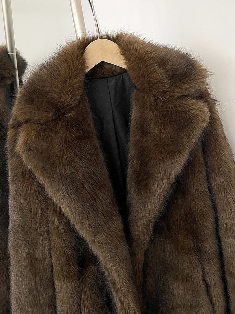 Manteau en fausse fourrure femme