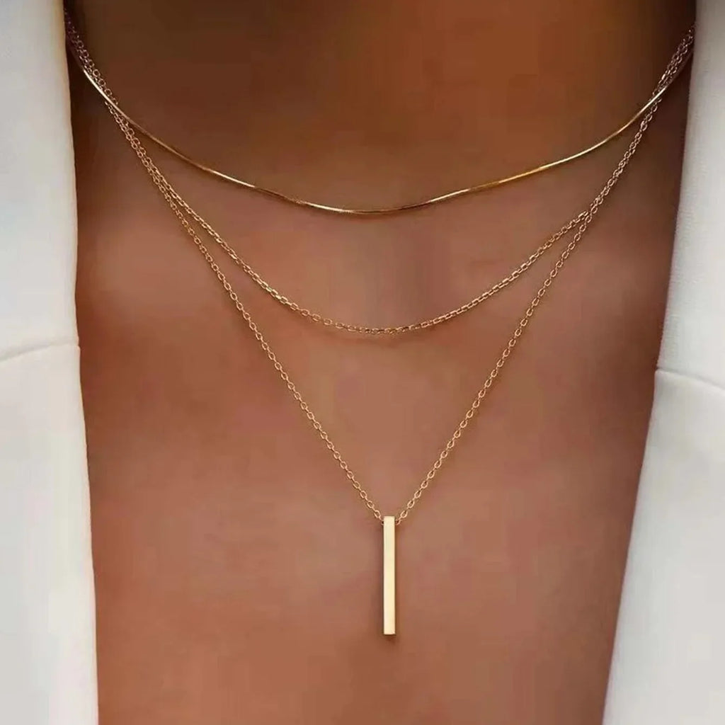 Collier multirang à pendentif barre – doré