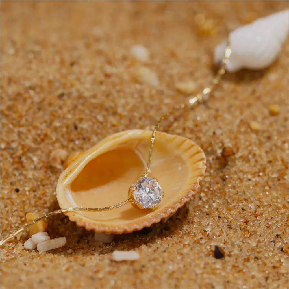 Collier point lumineux zircon
