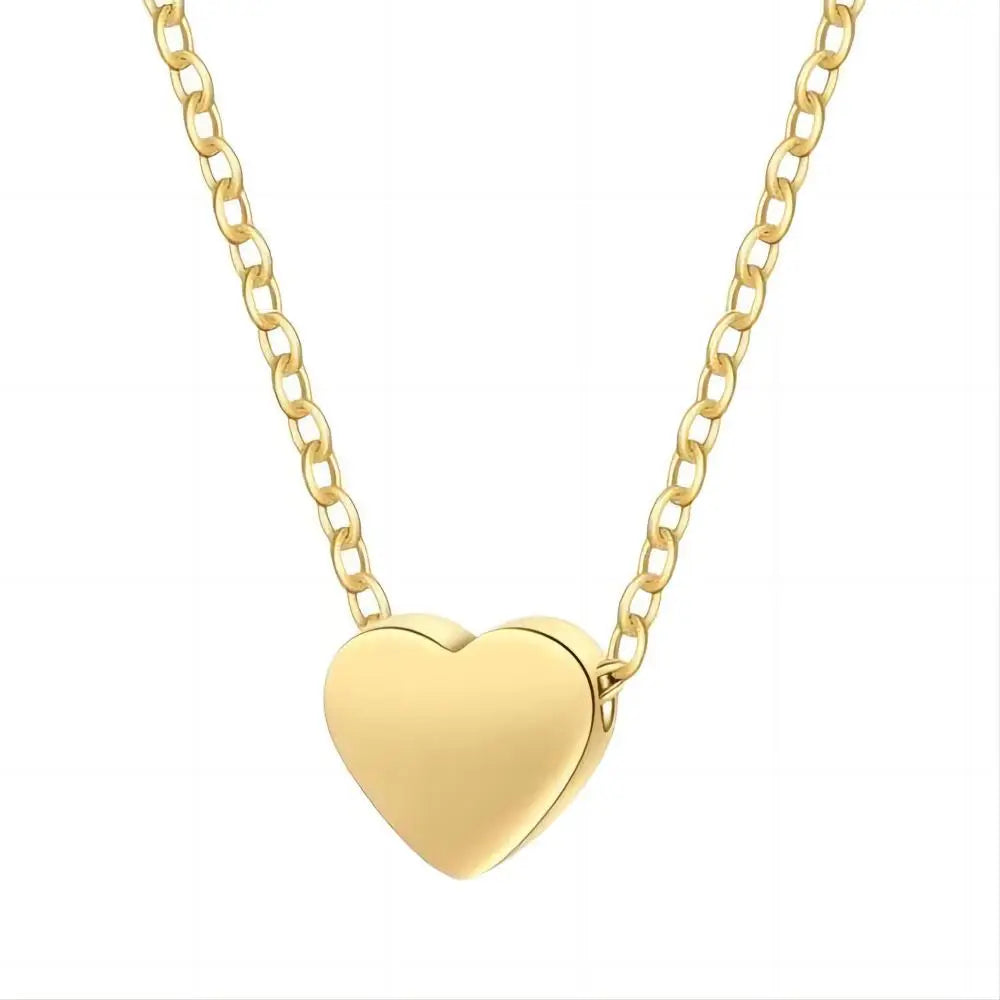 Collier point lumineux zircon – chaîne cœur dorée
