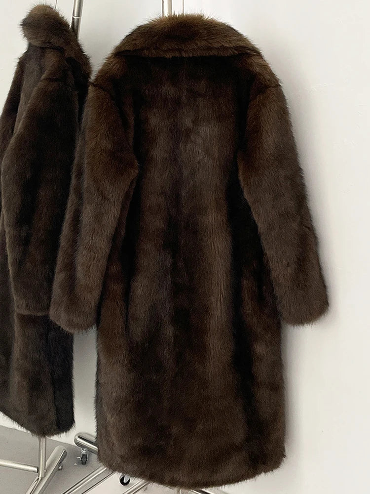 Manteau en fausse fourrure femme